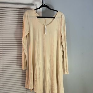 Women’s Large long-sleeved, lightweight cream mid dress. Never worn with tags.
